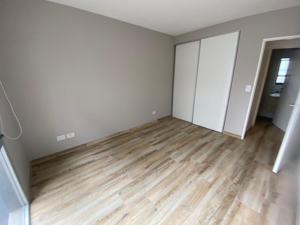 Dormitorio con placard